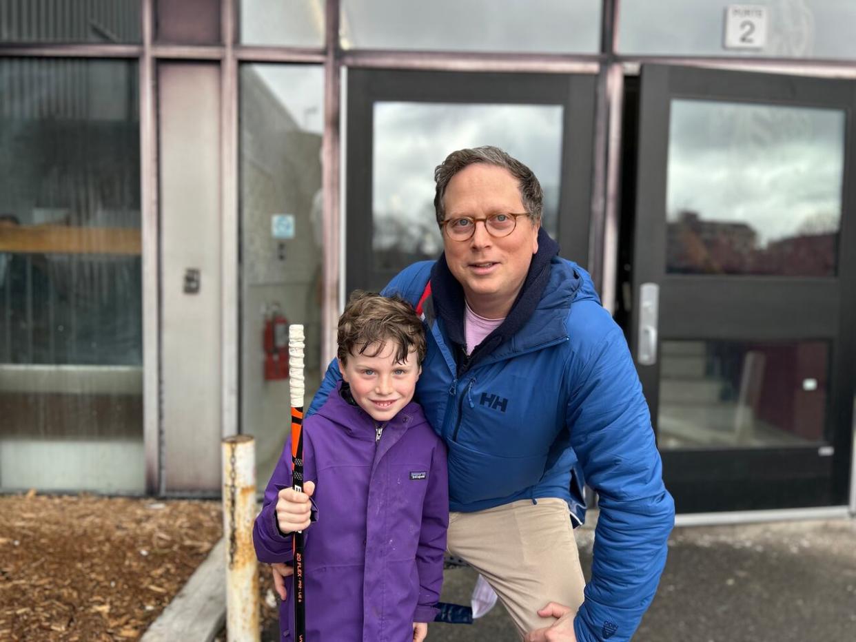 Samuel, 6, loves the Avalanche Kidz Hockey program, and his father Charlie Flicker said it would be 'extremely sad' for it to shut down due to the lack of ice time availability in the Montreal area.  (Douglas Gelevan/CBC - image credit)