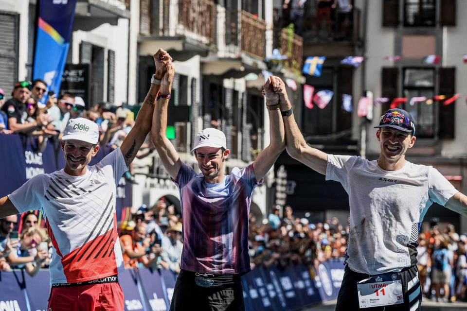 lr second placed frances mathieu blanchard l, winner spains kilian jornet c, and third placed britains thomas evans r celebrate on the podium of 19th edition of the ultra trail du mont blanc utmb a 171km trail race crossing france, italy and switzerland in chamonix, south eastern france on august 27, 2022 the spanish ultra trail star kilian jornet was victorious in the fourth ultra trail du mont blanc utmb of his career, setting a new record time of under twenty hours photo by jeff pachoud afp photo by jeff pachoudafp via getty images
