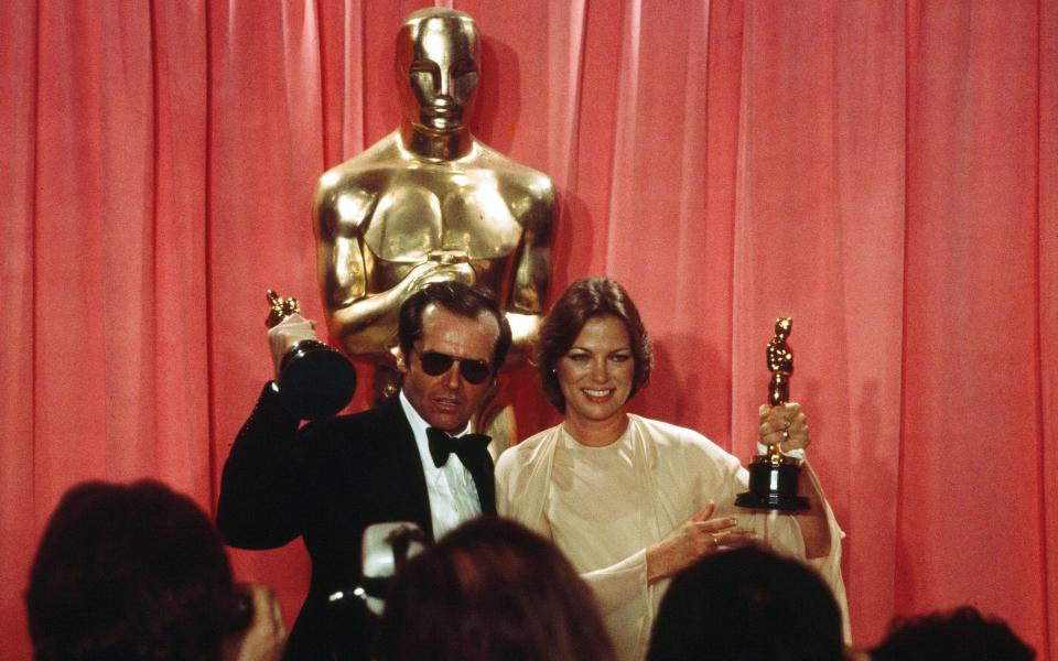With Jack Nicholson after their Best Actress and Best Actor wins at the Academy Awards in 1976 - Michael Montfort/Michael Ochs Archives/Getty Images