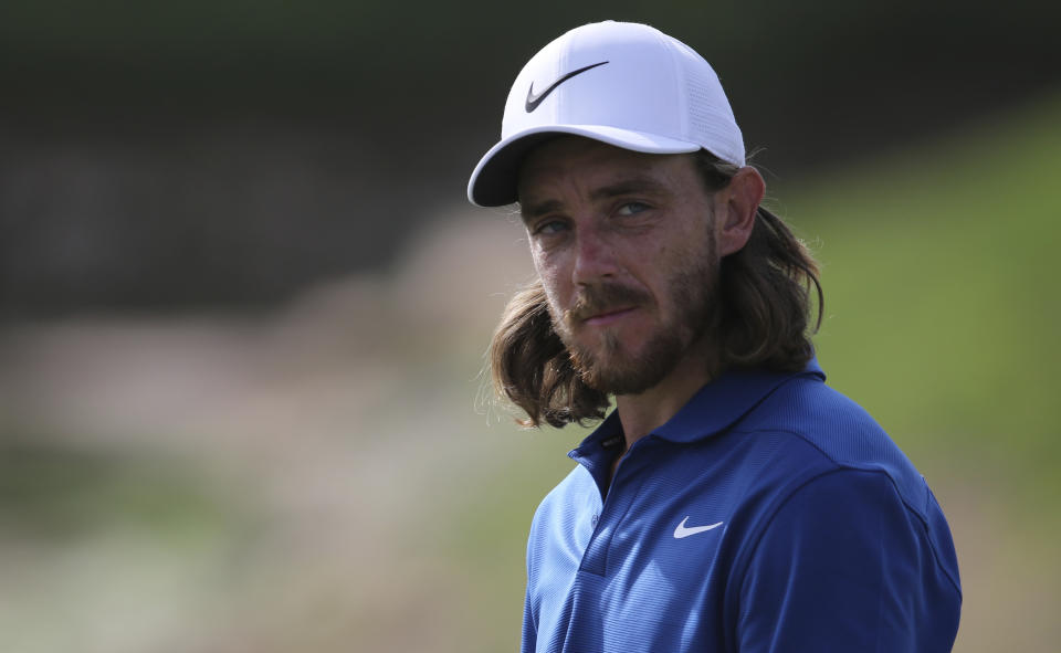 England's Tommy Fleetwood reacts on the 16th hole during the second round of the DP World Tour Championship golf tournament in Dubai, United Arab Emirates, Friday, Nov. 16, 2018. (AP Photo/Kamran Jebreili)