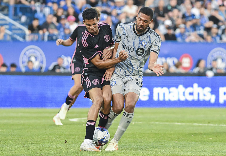 CF Montreal's George Campbell, right, challenges Inter Miami's Jean Corentin during first-half MLS soccer match action in Montreal, Saturday, May 27, 2023. (Graham Hughes/The Canadian Press via AP)