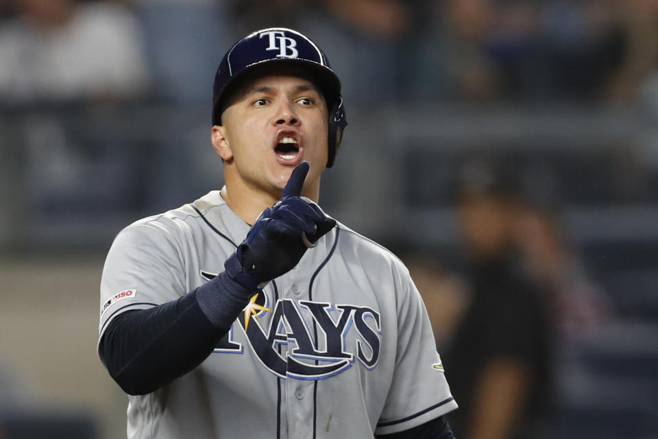 Tampa Bay Rays' Avisail Garcia has words with New York Yankees starting pitcher CC Sabathia during the sixth inning of a baseball game Tuesday, July 16, 2019, in New York. (AP Photo/Kathy Willens)