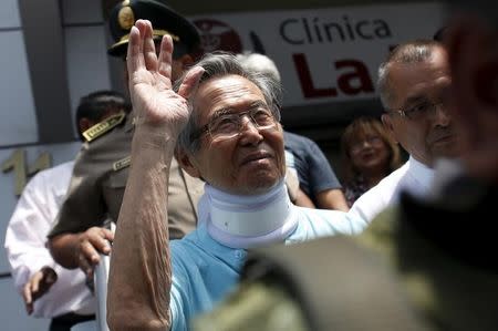 Peru's former President Alberto Fujimori leaves the clinic where he was transferred from his prison cell to undergo neurological tests after feeling dizzy and briefly losing the strength in his legs, his doctor said, in Lima, March 31, 2016. REUTERS/Janine Costa