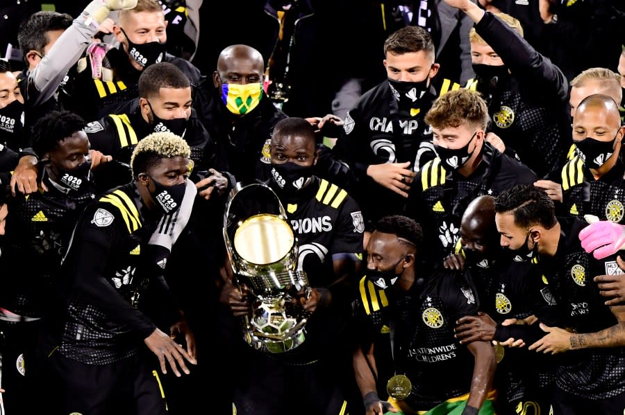 COLUMBUS, OHIO – DECEMBER 12: The Columbus Crew celebrates with the MLS Cup after a 3-0 win over the Seattle Sounders during the MLS Cup Final at MAPFRE Stadium on December 12, 2020 in Columbus, Ohio. (Photo by Emilee Chinn/Getty Images)