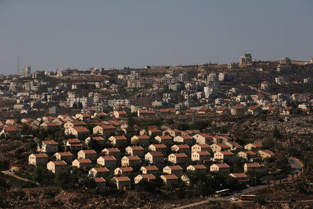 The West Bank Jewish settlement of Ofra is photographed as seen from the Jewish settler outpost of Amona in the West Bank, during an event organised to show support for Amona which was built without Israeli state authorisation and which Israel's high court ruled must be evacuated and demolished by the end of the year as it is built on privately-owned Palestinian land, October 20, 2016. REUTERS/Ronen Zvulun