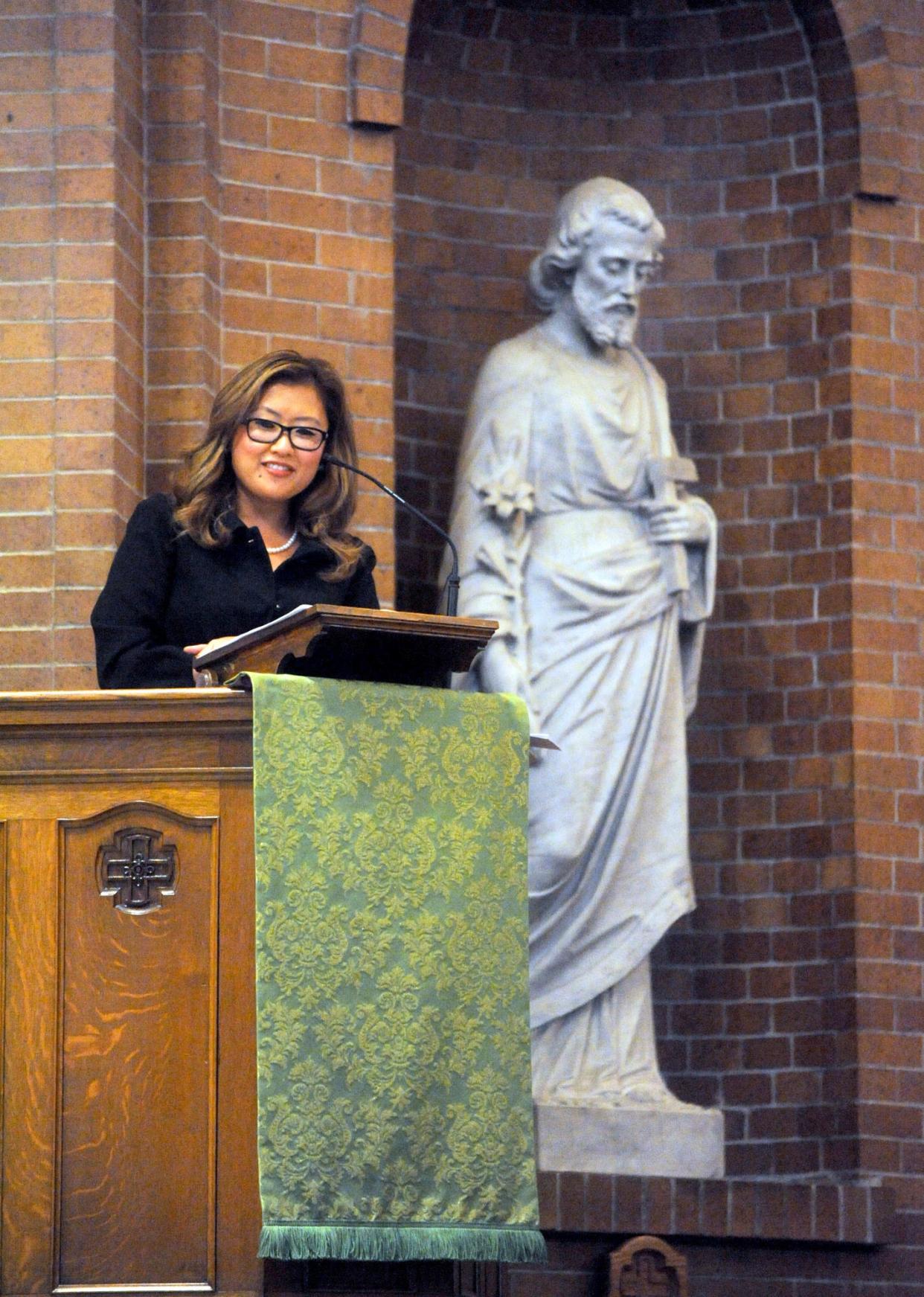 Michelle Li in the early 2010s, when she was a news anchor for WECT, emceeing at the the Daniel Pearl World Music Days Peace Through Music concert at St. Mary Catholic Church in Wilmington.