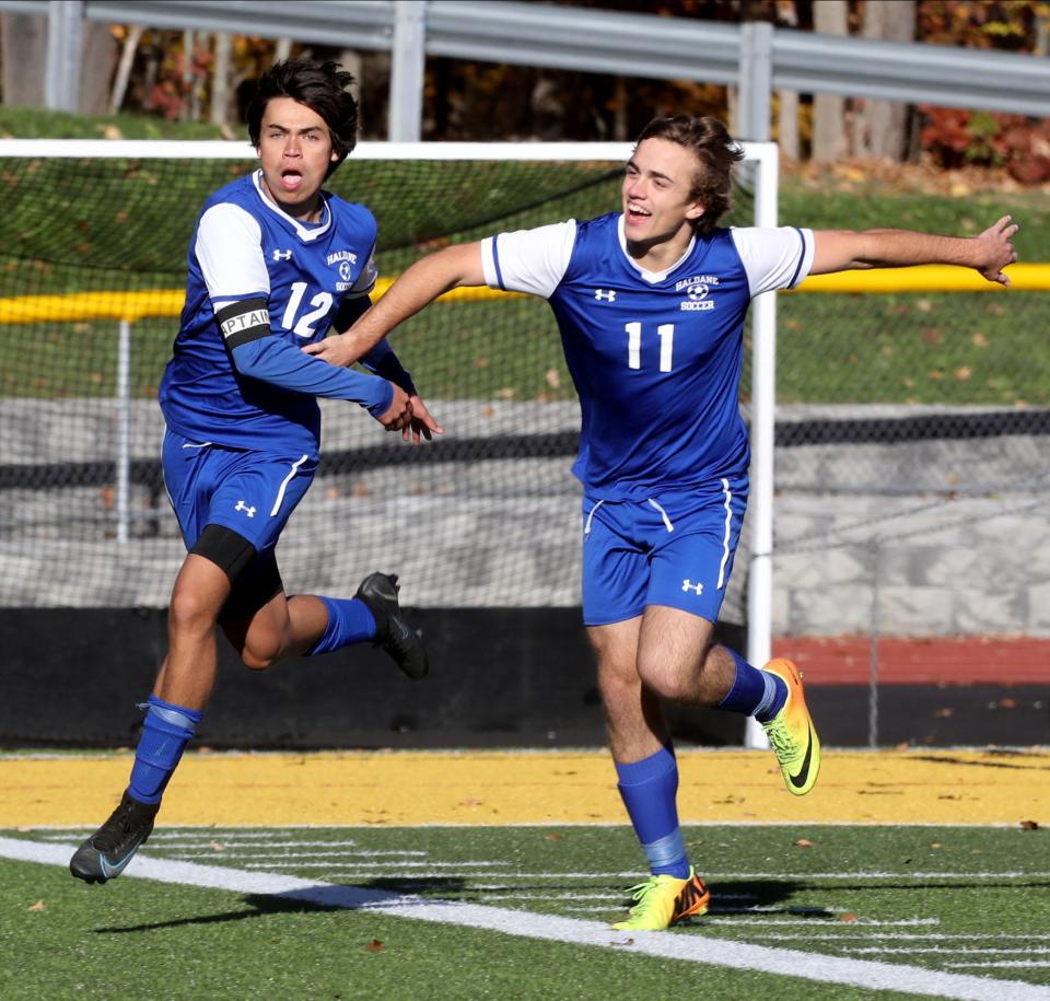 Ryan Eng-Wong of Haldane celebrates with Luca Van Dommele after scoring the first goal of the game in  the Section 1 Class C soccer championship at Lakeland High School Oct. 20, 2022. Haldane defeated Alexander Hamilton 8-2.