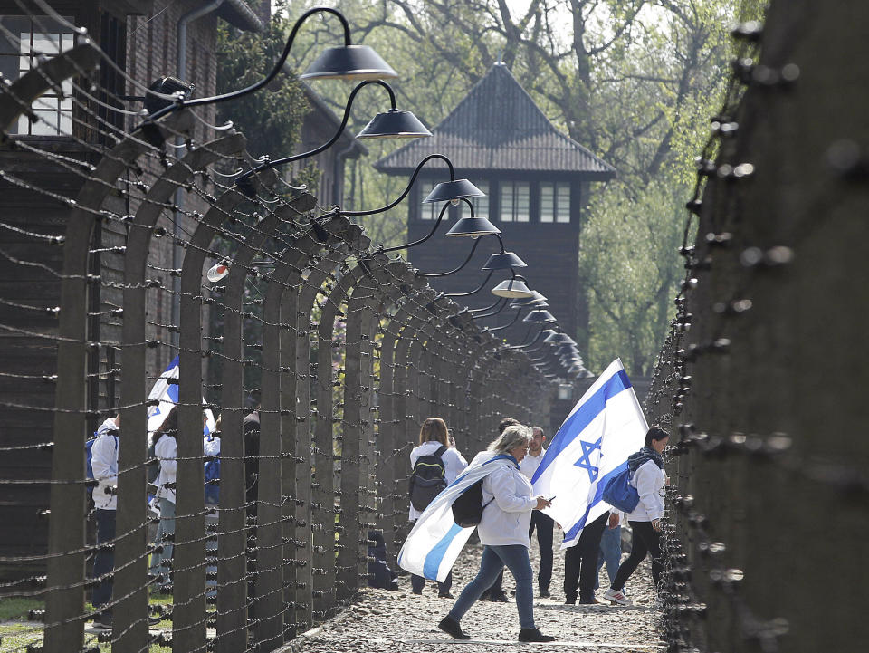 Participants in the Jewish event of Holocaust remembrance walk in the former Nazi World War II death camp of Auschwitz in Oswiecim, Poland, in May 2019. (Photo: ASSOCIATED PRESS)