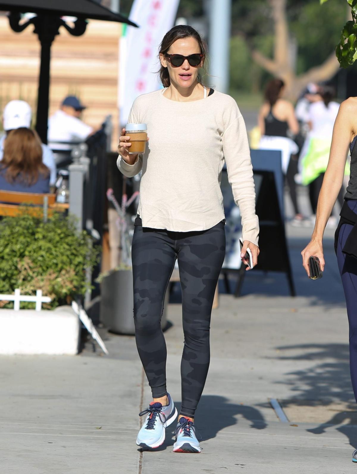 Jennifer Garner dons a knit cardigan and camo leggings while out during her  morning errands in