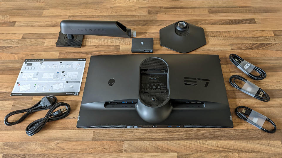 Alienware AW2724HF unboxed with all accessories on a desk