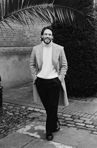 <p>Rosaline Shahnavaz</p> Richard James coat and knitwear. Scott Fraser Collection trousers. Vintage Belt. Pantherella socks. Grenson shoes.