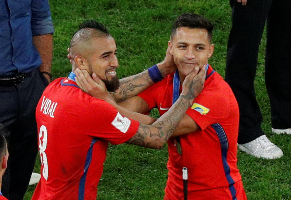 Soccer Football – Chile v Germany – FIFA Confederations Cup Russia 2017 – Final – Saint Petersburg Stadium, St. Petersburg, Russia – July 2, 2017 Chile’s Arturo Vidal and Alexis Sanchez embrace at the end of the match REUTERS/Maxim Shemetov