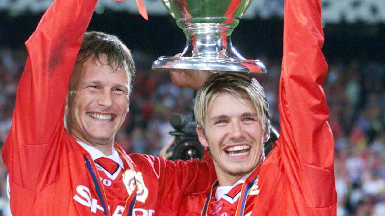 Teddy Sheringham and David Beckham were part of the great Manchester United team shown in new docuseries 99. (Patrick Hertzog/AFP)