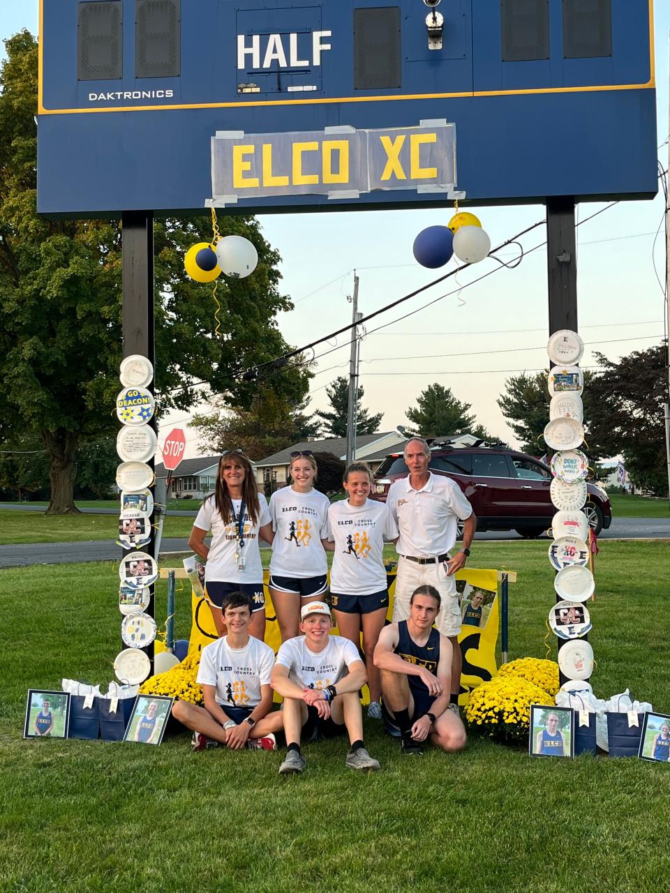 The Elco cross country seniors are pictured with their coaches. Deacon Shearer, bottom center, is also the trumpet section leader in the Raiders' marching band.