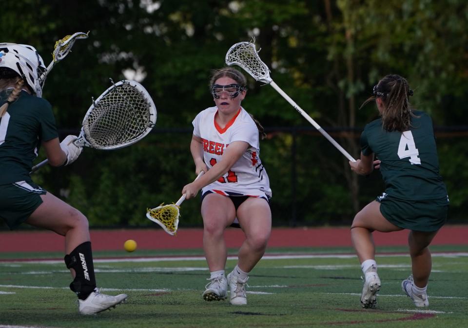 Horace Greeley's Logan Skuro (11) scores a goal during the girls lacrosse Section 1 Class A championship game against Yorktown at Nyack High School in Nyack on Friday, May 26, 2023.