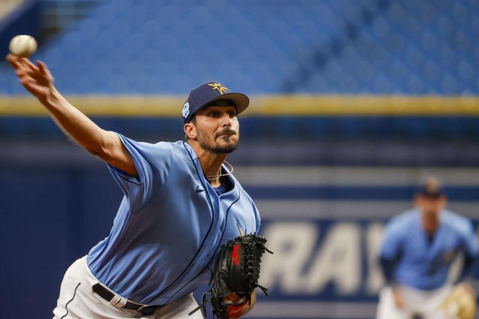 Tampa Bay Rays starting pitcher Zach Eflin (24) delivers in the first inning of a spring training baseball game against the Minnesota Twins at Tropicana Field in St. Petersburg, Fla., Thursday, March 2, 2023. (Ivy Ceballo/Tampa Bay Times via AP)