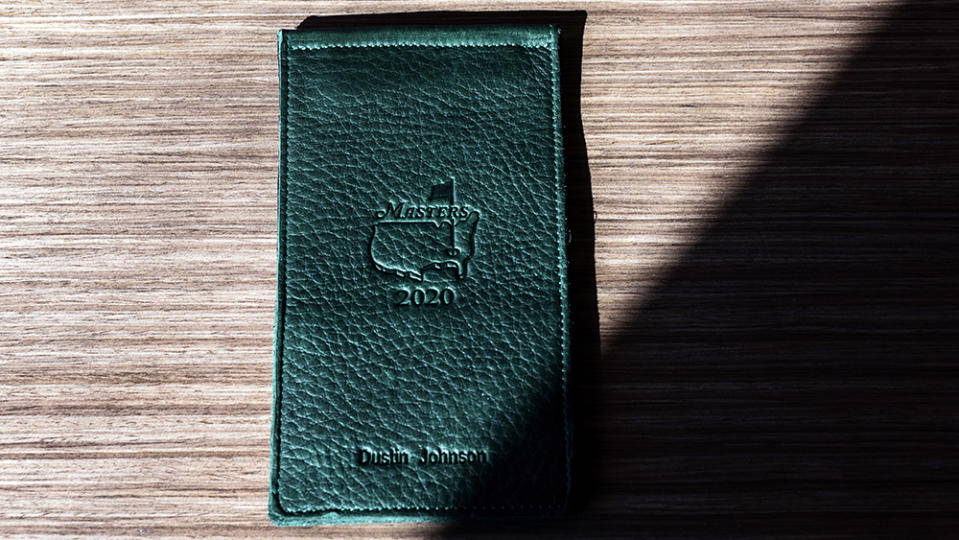 A yardage book holder from the 2020 Masters, which Johnson won. - Credit: Saul Martinez