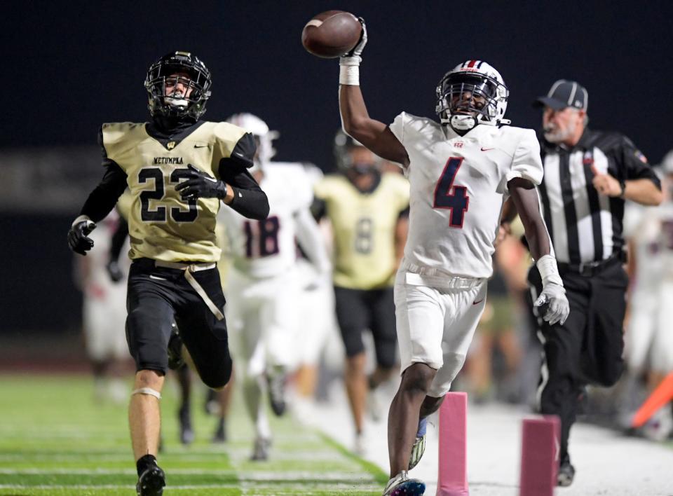 Pike Road's Jordan King (4) returns the second half kickoff for a touchdown against Wetumpka High School during their game in Wetumpka, Ala., on Friday September 8, 2023.