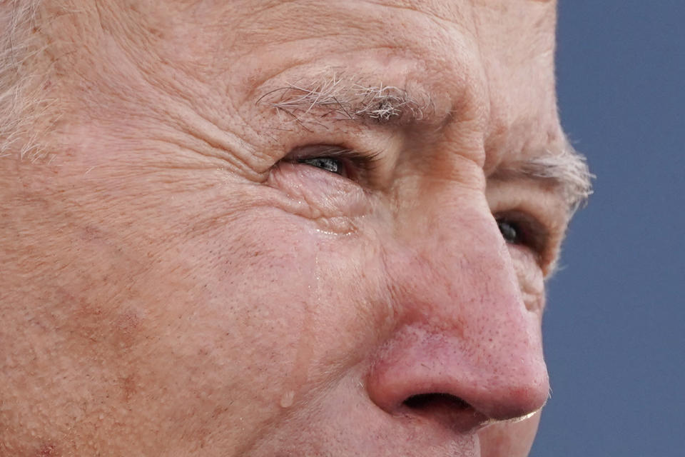 President-elect Joe Biden tears up as he speaks at the Major Joseph R. "Beau" Biden III National Guard/Reserve Center, Tuesday, Jan. 19, 2021, in New Castle, Del. (AP Photo/Evan Vucci)