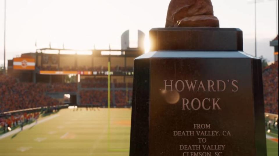 An virtual rendering of Howard’s Rock, which sits atop The Hill on the east side of Memorial Stadium in Clemson, in EA Sports College Football 25. Visible from afar are Clemson’s home locker room entrance (middle left), luxury suites (middle) and The Oculus (top middle).
