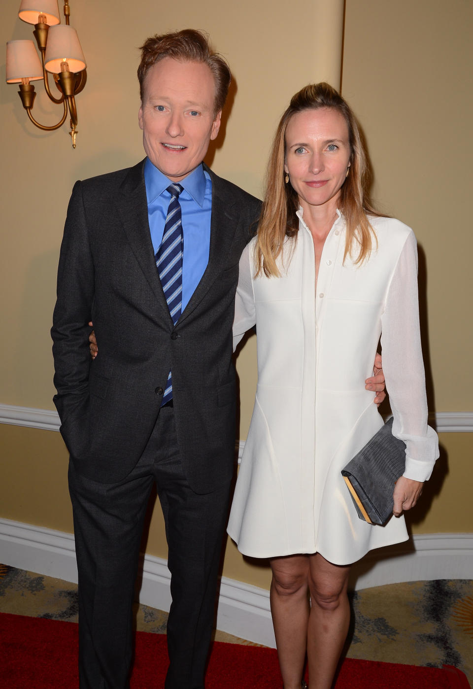 Conan and his wife Liza Powel O'Brien. They have two children.