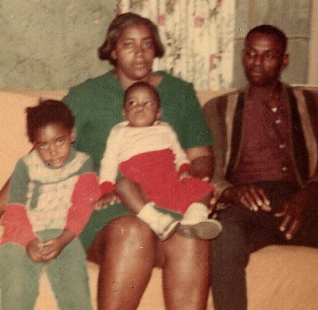 A fall 1967 photo of married couple Arwilda Whiteside (42) and Cleovis Whiteside (46). The children in the photo are Arwilda and Cleovis' daughter, 3-year-old Marian, and their 1-year-old grandson James.