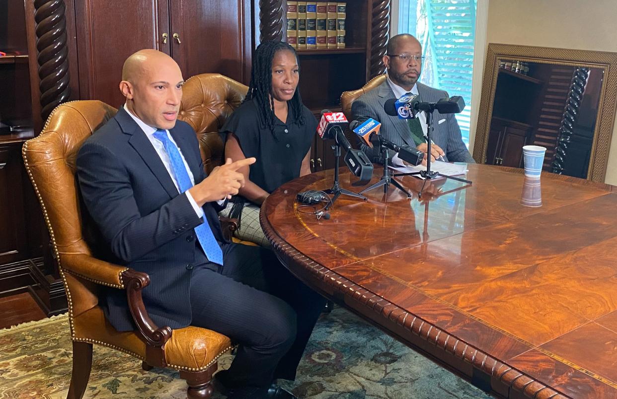 Attorney Nick Johnson speaks during a news conference on Monday, April 15, 2024 at the West Palm Beach office of the Osborne & Francis Law Firm. He is joined Marla McKenney, the mother of homicide victim Kelvi McCray, and attorney Greg Francis.