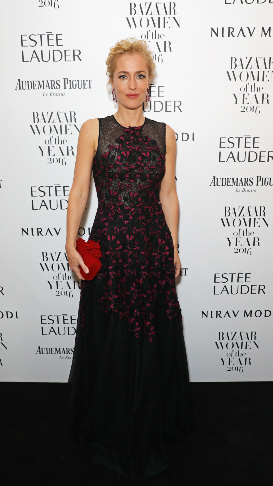 <p> At the Harper's Bazaar Women Of The Year Awards in London in 2016, Anderson looked the epitome of chic. The actress dazzled in a black gown by Sophia Kah, which featured intricate red embroidered detailing. She accessorised with red statement earrings and a matching clutch. </p>