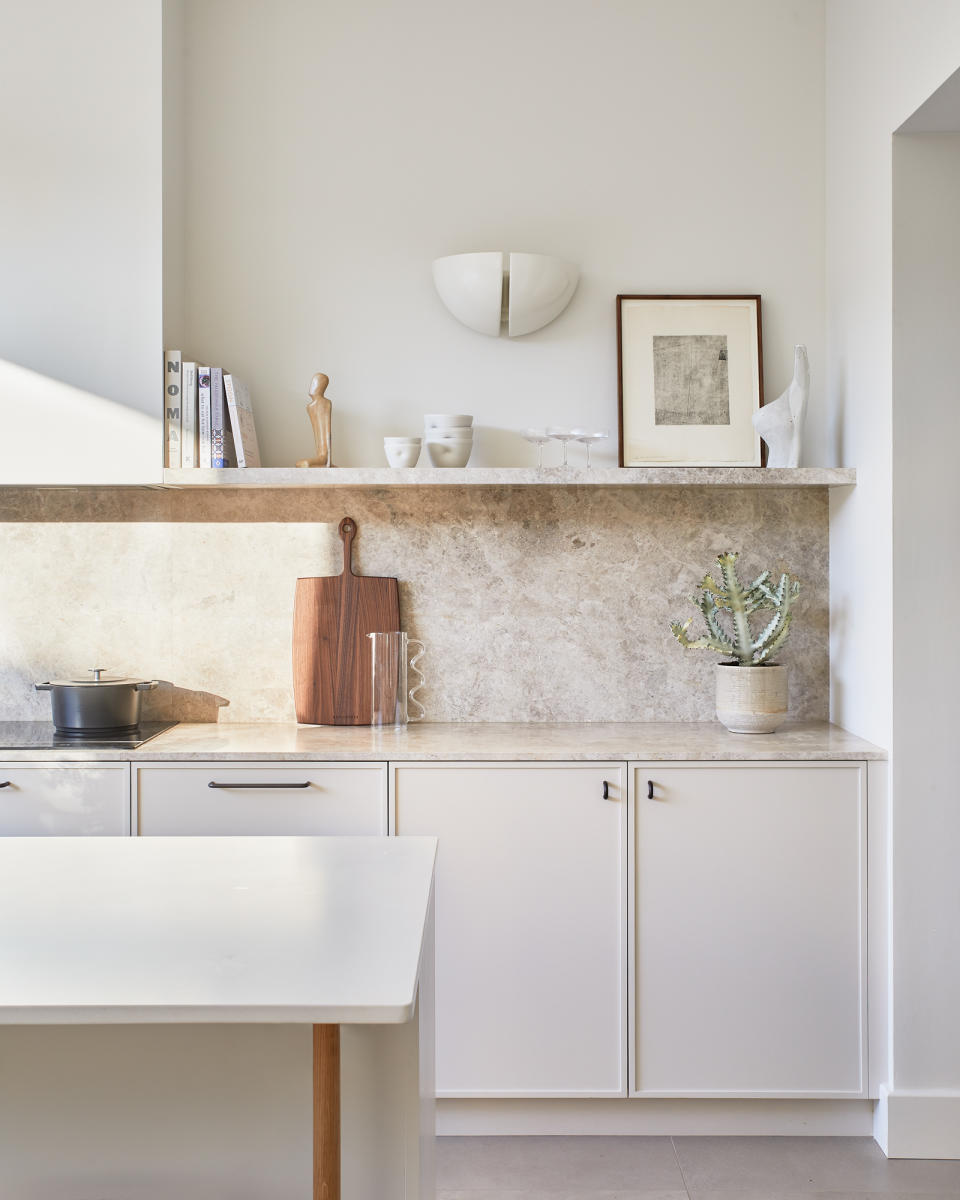 A white kitchen with open shelving