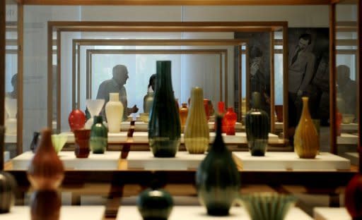 Visitors at the new Stanze del Vetro (Glass Rooms) museum on San Giorgio Maggiore island. Over 300 bowls, vases and glasses are on display at an exhibition paying tribute to 20th century glassmaking through the experimental work of architect Carlo Scarpa