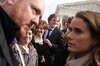 <p>Conservative Christian baker Jack Phillips (C), his daughter Lisa (3rd L) and other members of his family and legal team pose for photographs in front of the Supreme Court after the court heard the case Masterpiece Cakeshop v. Colorado Civil Rights Commission on Dec. 5, 2017 in Washington. (Photo: Chip Somodevilla/Getty Images) </p>