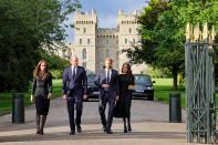 <p>From left: Catherine, Princess of Wales; Prince William, Prince of Wales; Prince Harry, Duke of Sussex; and Meghan, Duchess of Sussex on their walkabout at Windsor Castle on Sept. 10, 2022 in England. (Photo by Chris Jackson/Pool/AFP via Getty Images)</p> 