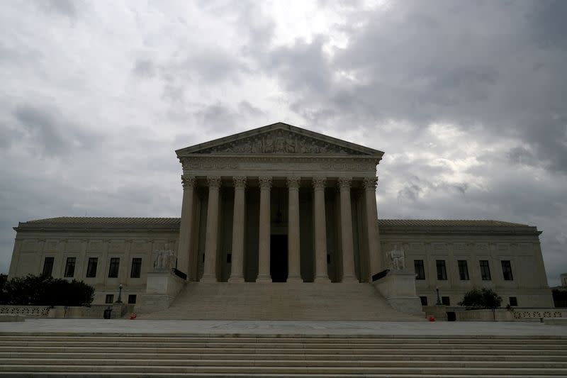 FILE PHOTO: FILE PHOTO: Storm clouds roll over the U.S. Supreme Court