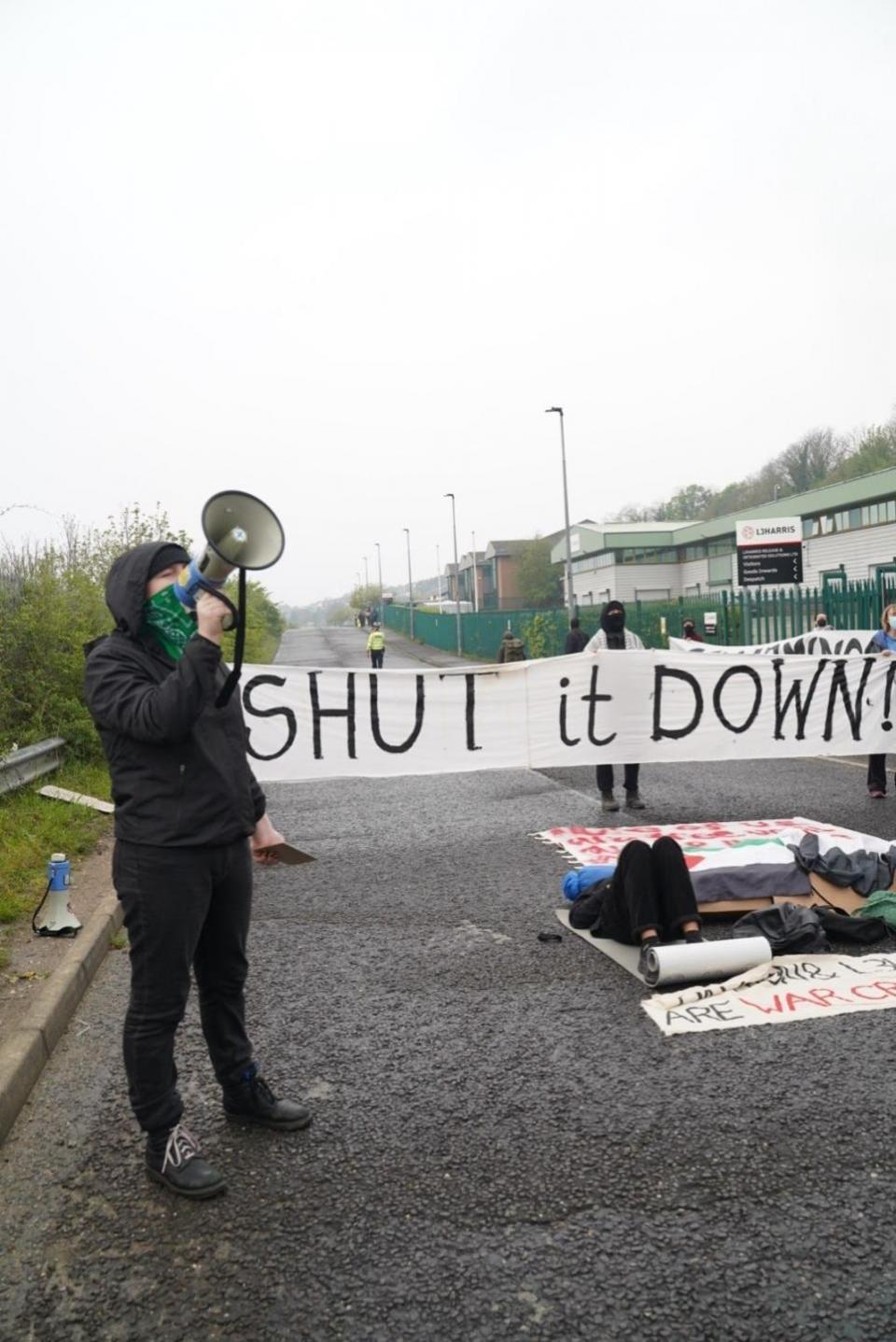 The Argus: A protester using a megaphone outside L3Harris