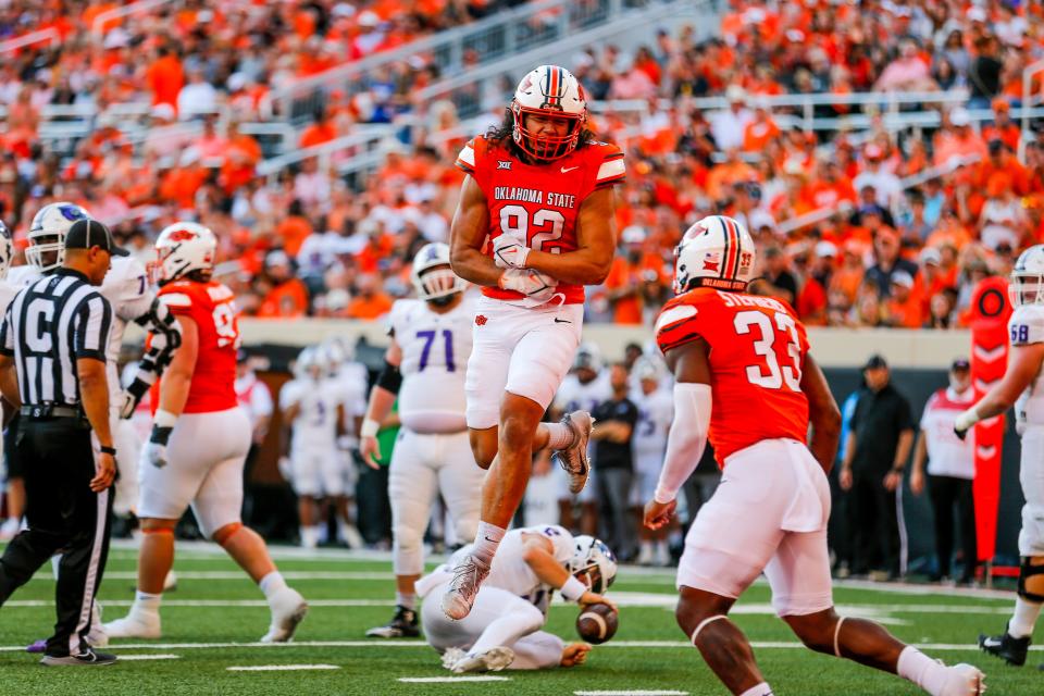OSU's Nathan Latu (92) celebrates after sacking the quarterback in the first quarter against Central Arkansas on Sept. 2 at Boone Pickens Stadium in Stillwater.