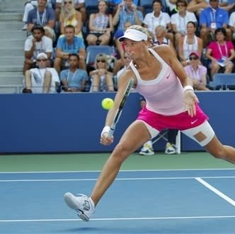 Czech Republic's Andrea Hlavackova returns a shot to Russia's Maria Kirilenko in the third round of play at the 2012 US Open tennis tournament, Saturday, Sept. 1, 2012, in New York. (AP Photo/Paul Bereswill)