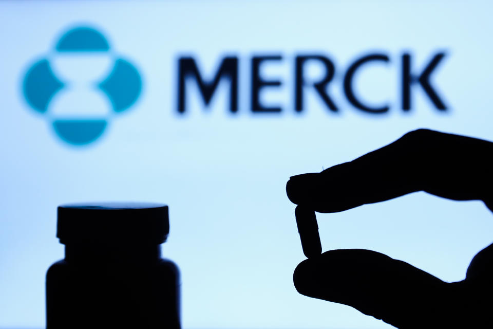 Medicine pill is seen with Merck logo displayed on a screen in the background in this illustration photo taken in Poland on October 4, 2021. (Photo by Jakub Porzycki/NurPhoto via Getty Images)