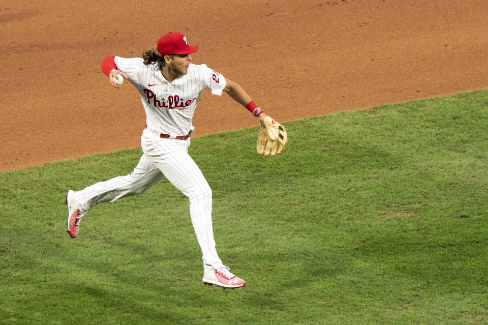 Philadelphia Phillies third baseman Alec Bohm throws the ball to first during the fifth inning of a baseball game against the New York Mets, Saturday, Aug. 15, 2020, in Philadelphia. (AP Photo/Chris Szagola)