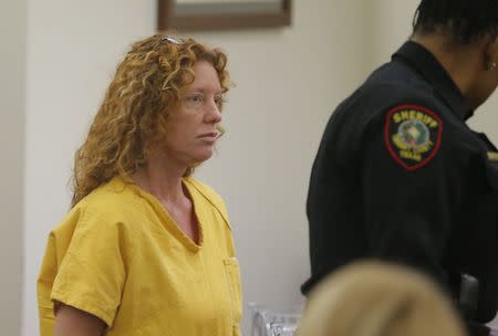 Tonya Couch (L) enters the courtroom to appear before state District Judge Wayne Salvant in Fort Worth, Texas, January 8, 2016. REUTERS/Rodger Mallison/Fort Worth Star-Telegram/Pool