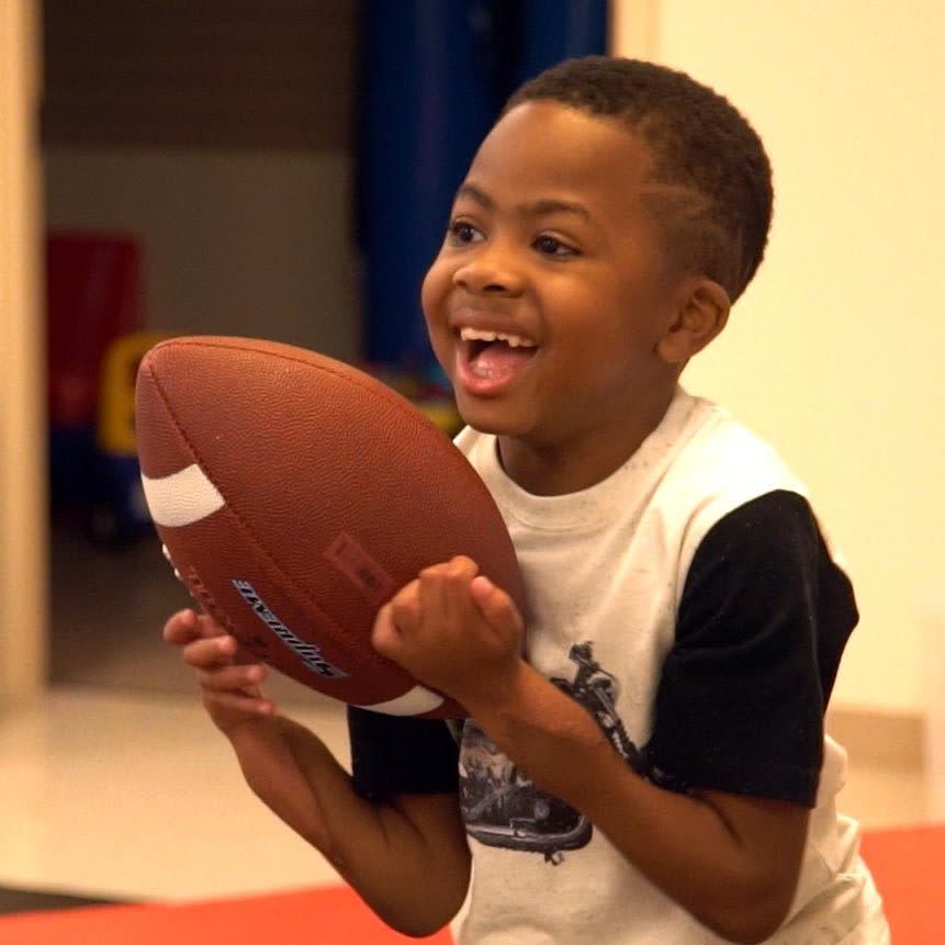 Zion Harvey catching an American football - Credit:  PA