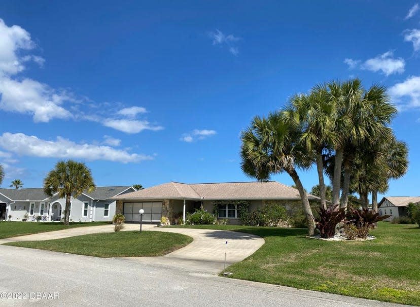 A circular driveway leads to this Ormond Beach ranch-style home that is just down the street from the beach walkover, Seabridge park’s kayak launch and fishing pier, plus Highbridge park’s boat launch and hiking trails.