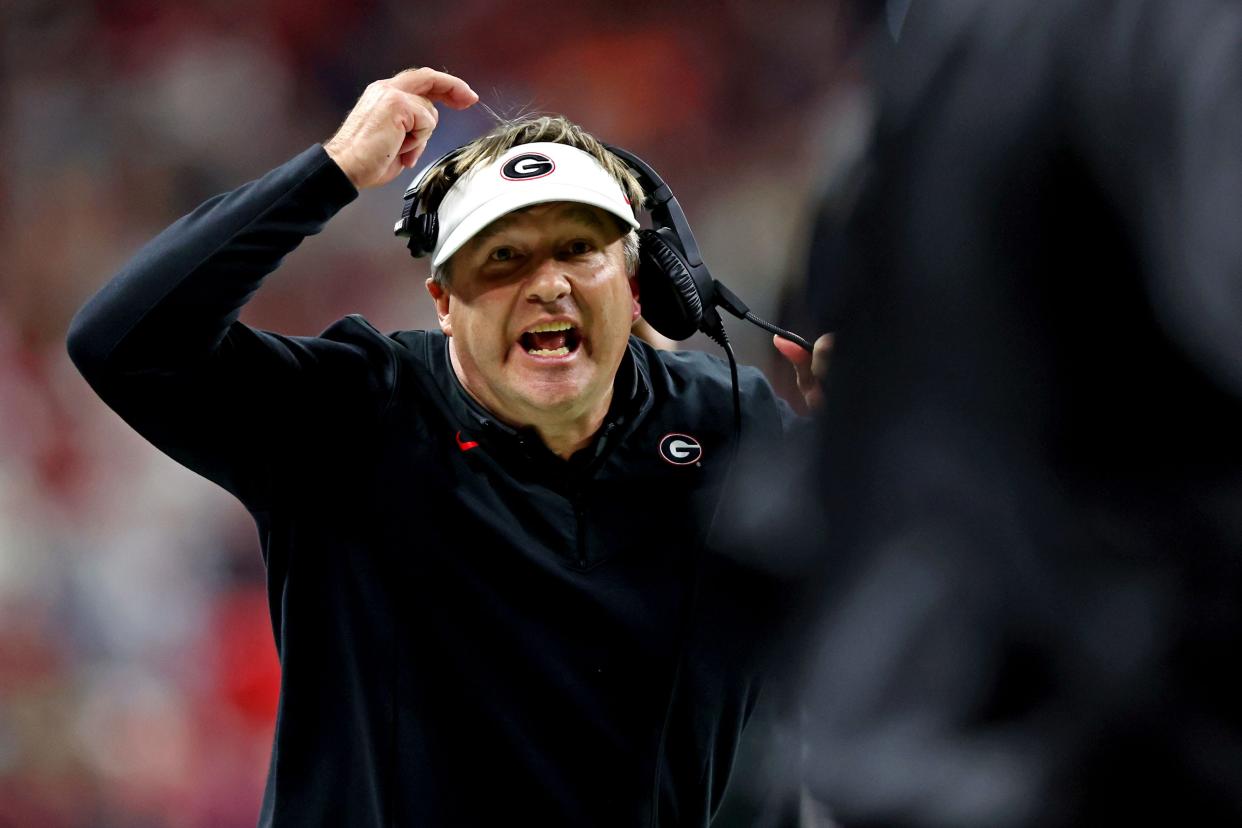 Georgia Bulldogs head coach Kirby Smart reacts during the first quarter against the Alabama Crimson Tide in the 2022 CFP college football national championship game at Lucas Oil Stadium.