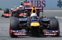 Red Bull Racing driver Sebastian Vettel of Germany leads McLaren Mercedes driver Lewis Hamilton from Great Britain during the Canadian Formula One Grand Prix on June 10, 2012 at the Circuit Gilles Villeneuve in Montreal. AFP PHOTO/Stan HONDASTAN HONDA/AFP/GettyImages