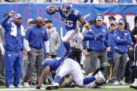 <p>New York Giants running back Saquon Barkley (26) leaps over Jacksonville Jaguars defensive back Tashaun Gipson (39) and offensive guard Jon Halapio (75) during the second half at MetLife Stadium. Mandatory Credit: Vincent Carchietta-USA TODAY Sports </p>