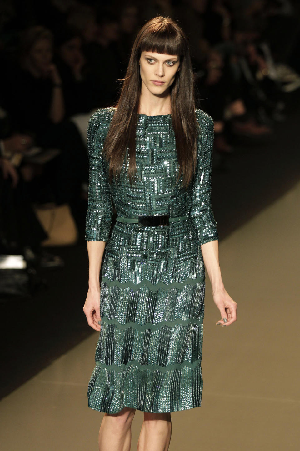 A model presents a creation by Lebanese designer Elie Saab as part of his Women's Fall-Winter, ready-to-wear 2013 fashion collection, during the Paris Fashion week, Wednesday, March 7, 2012. (AP Photo/Michel Euler)