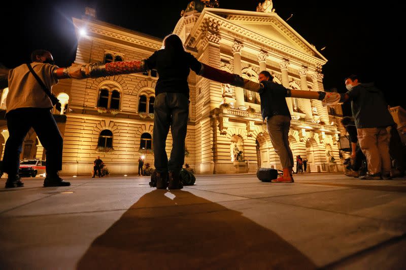 Climate change activists take part in a demonstration called "Rise up for change" in Bern