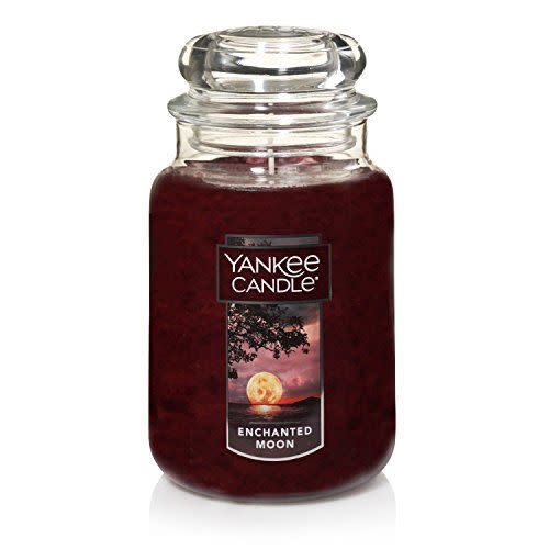 <p><strong>Yankee Candle</strong></p><p>amazon.com</p><p><strong>$24.13</strong></p><p><a href="https://www.amazon.com/dp/B07FCSTXFX?tag=syn-yahoo-20&ascsubtag=%5Bartid%7C10050.g.22221887%5Bsrc%7Cyahoo-us" rel="nofollow noopener" target="_blank" data-ylk="slk:Shop Now;elm:context_link;itc:0;sec:content-canvas" class="link ">Shop Now</a></p><p>Set a spooky scene with this Halloween candle. Scents of juniper, peony, and teak will transport you to an evening lit by a full moon.</p>