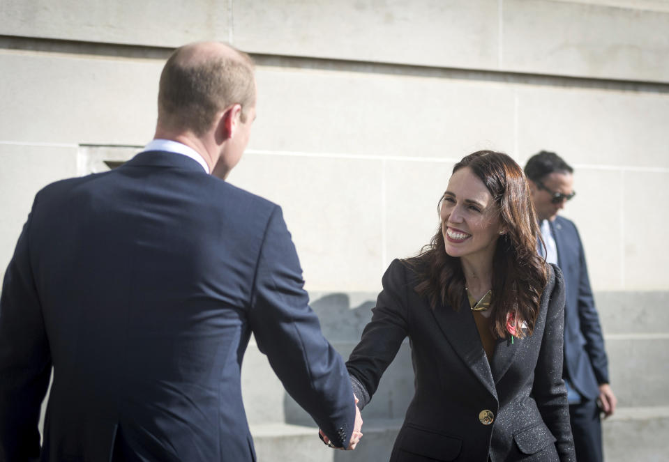 Britain's Prince William and New Zealand's Prime Minister Jacinda Ardern shake hands as they attend an Anzac Day service at Auckland War Memorial Museum in Auckland, New Zealand Thursday, April 25, 2019. (Mark Tantrum/The New Zealand Government via AP)