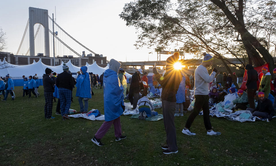 Runners wait near the Verrazano-Narrows Bridge before the New York City Marathon, Nov. 3, 2019, in New York. (Photo: Craig Ruttle/AP)