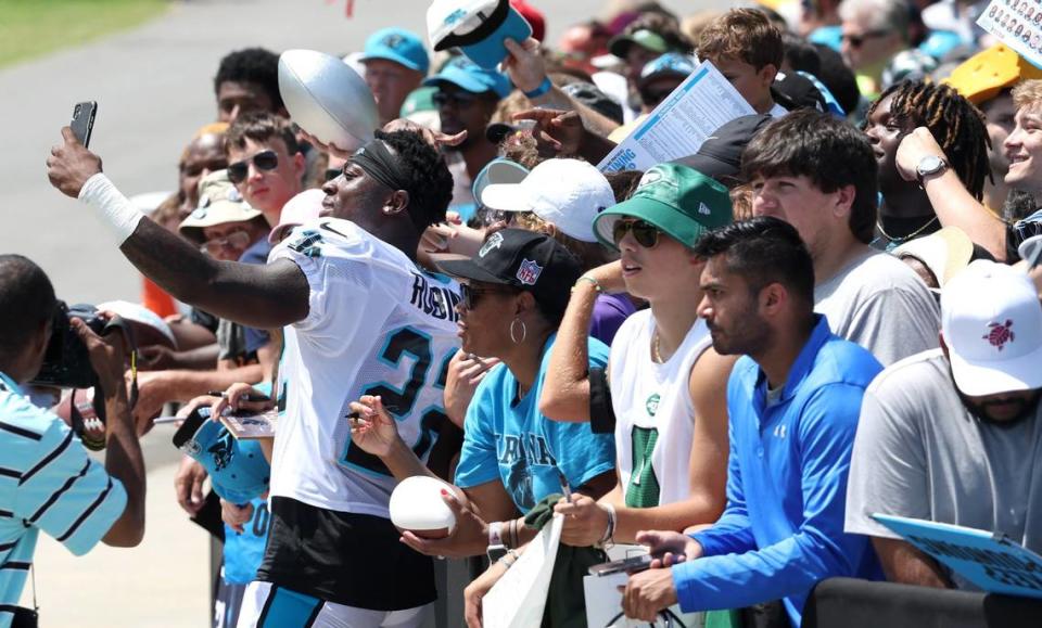 Carolina Panthers safety Jammie Robinson takes a selfie with the fans following the team’s joint practice with the New York Jets on Wednesday, August 9, 2023 at Wofford College in Spartanburg, SC.